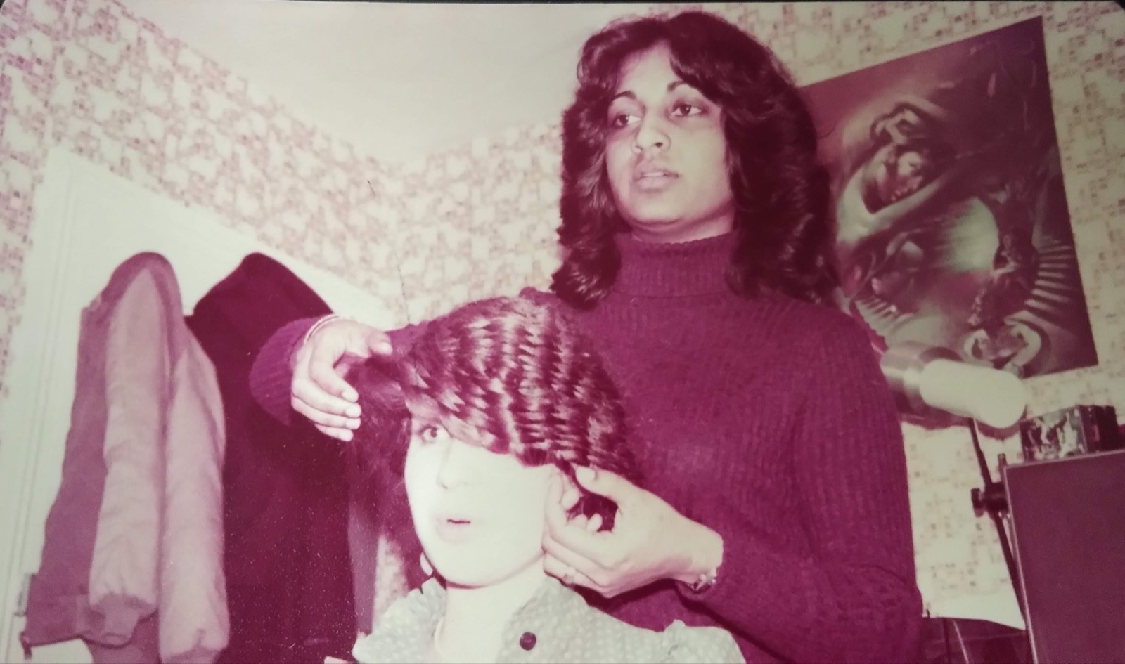 A young Nayana Karunaratne demonstrating hairstyling techniques