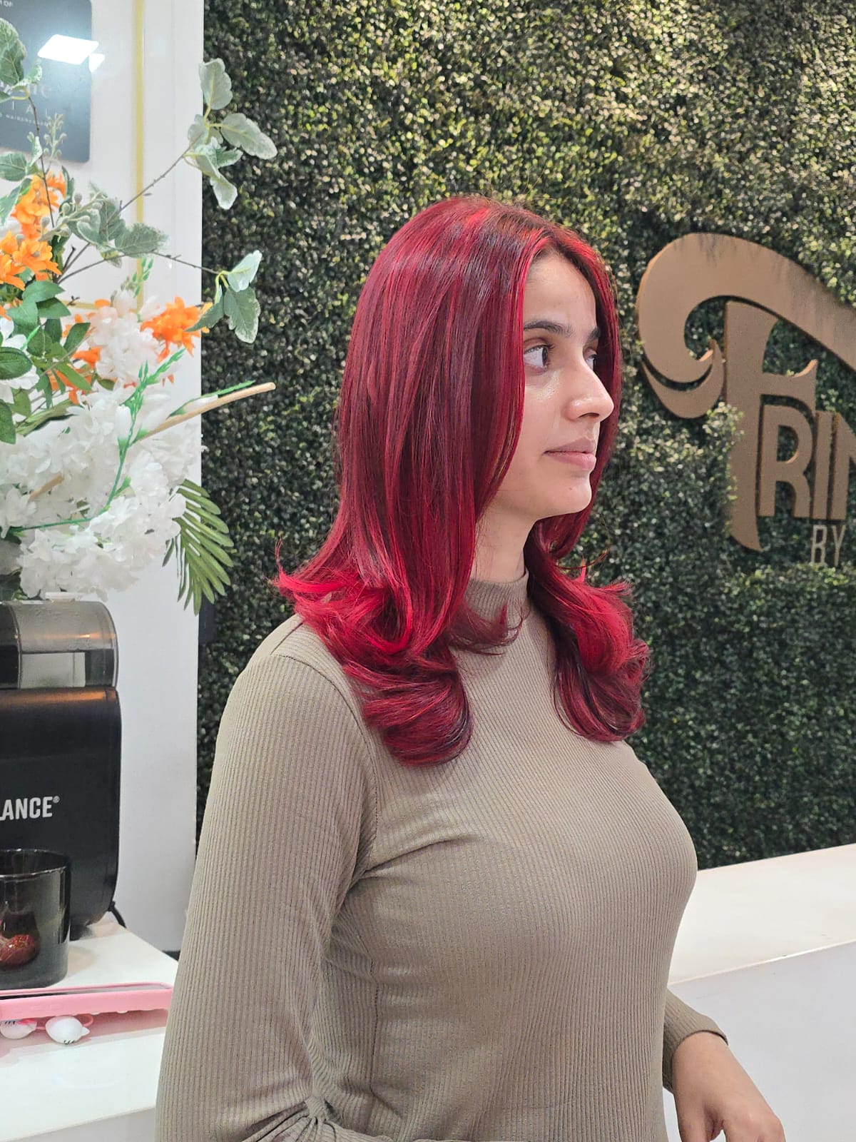 Rich burgundy colour with smooth, layered styling